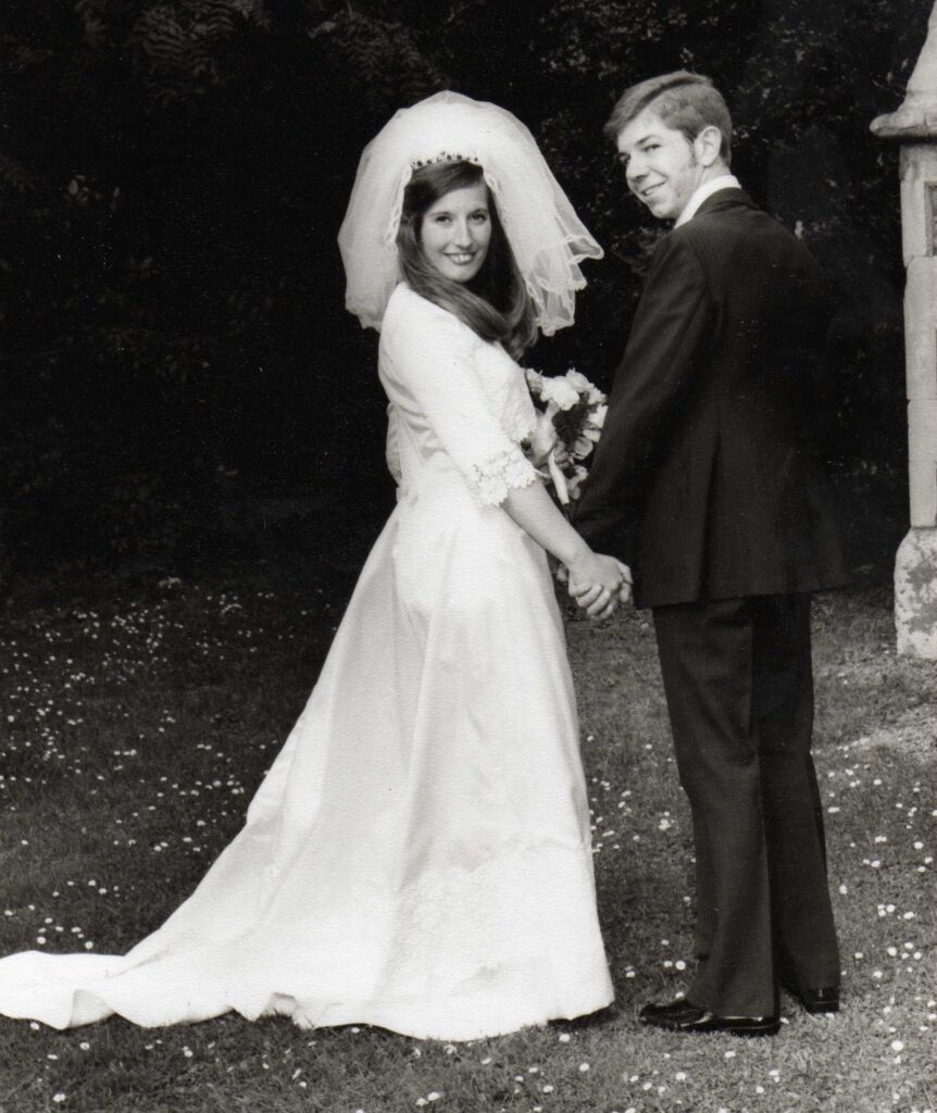 Couple in a wedding photo outside church