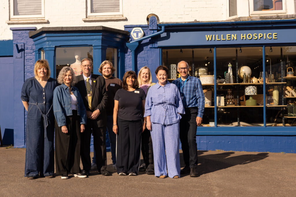 Group of people outside shop